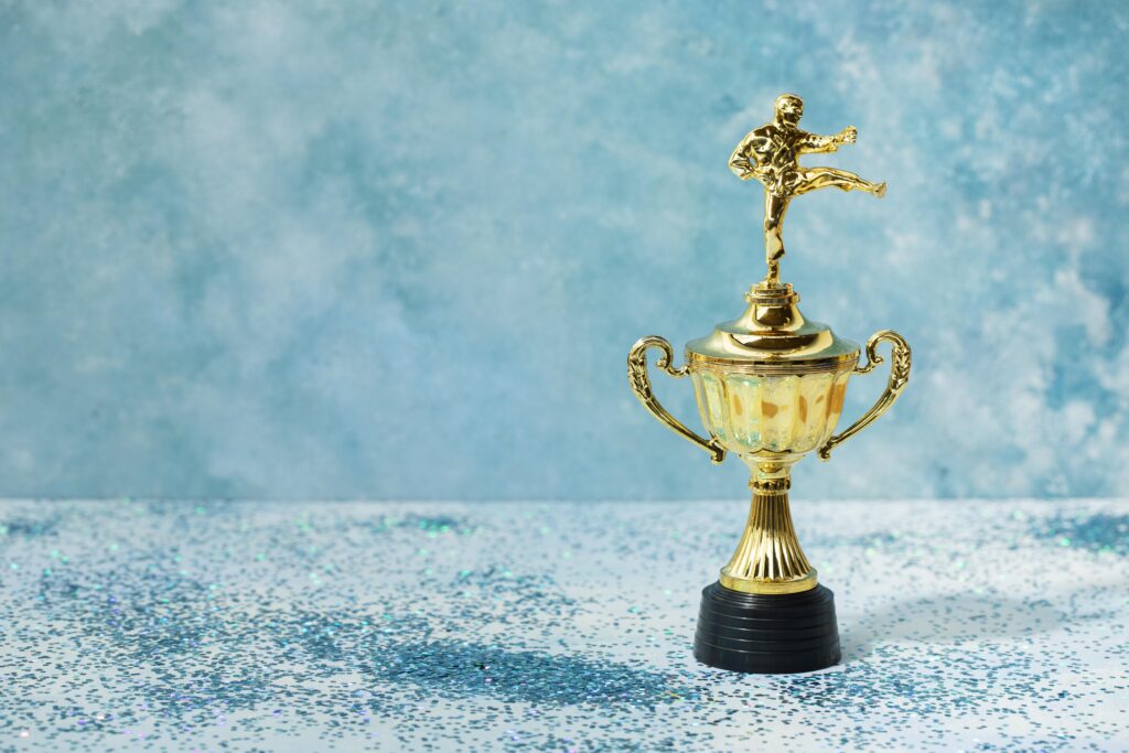 winner concept with man cup prize