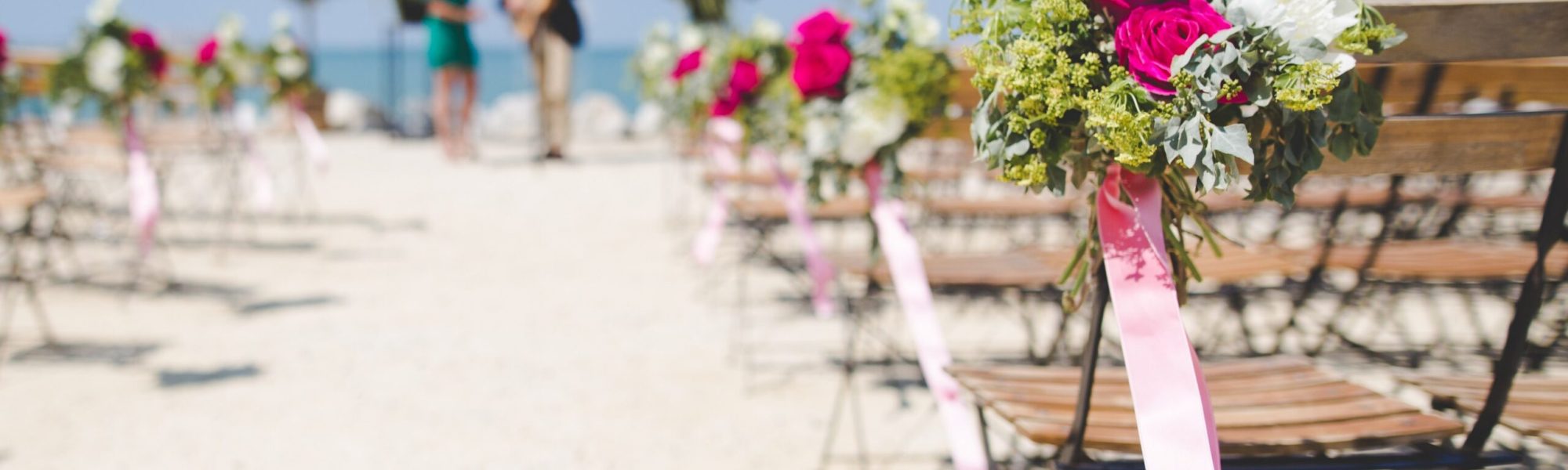 200498 a beachfront wedding is being set up while a music